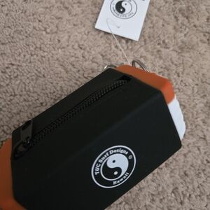 T&C Surf Designs Black and Orange Keychain